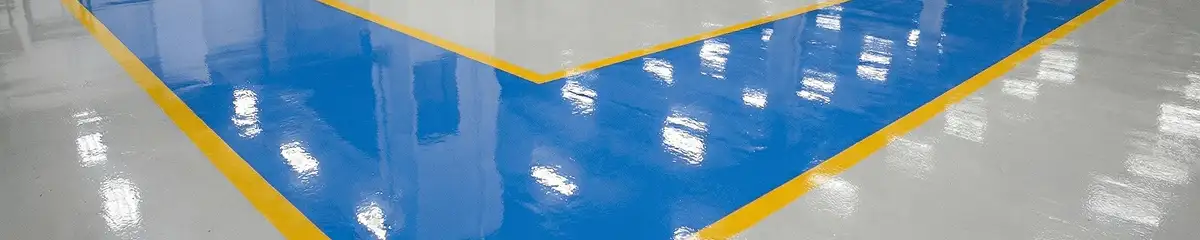 A factory floor professionally covered and marked with epoxy flooring in Jersey City, NJ