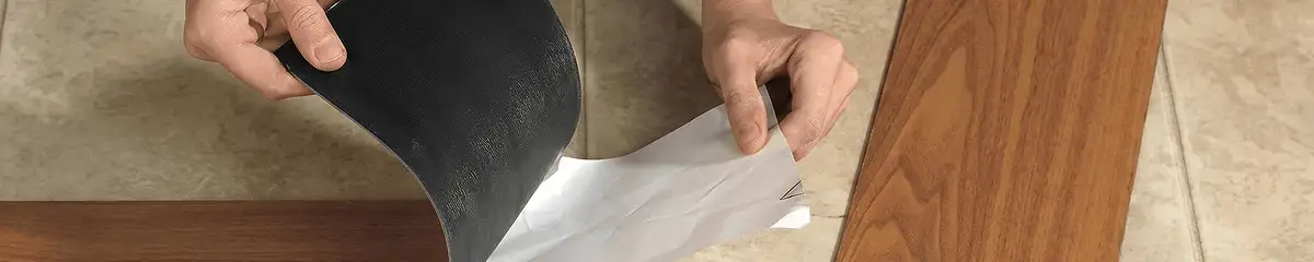 A professional installing vinyl flooring in Jersey City, NJ